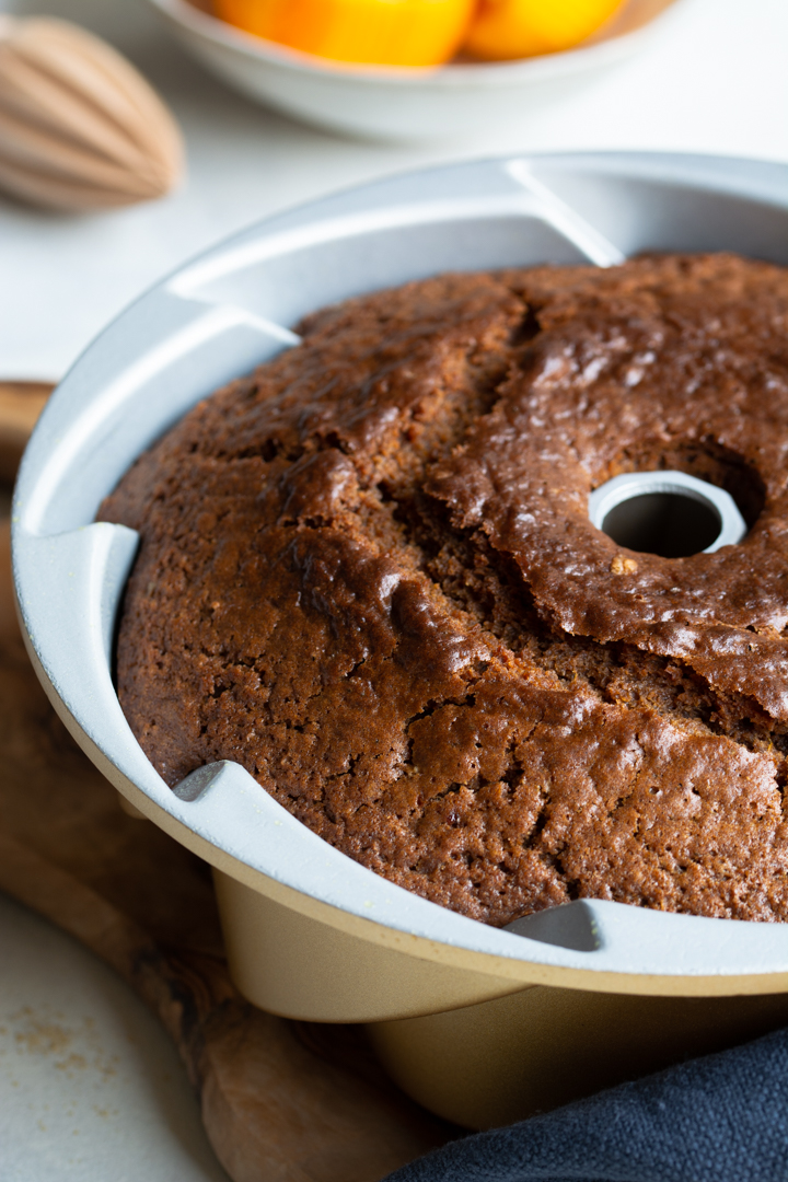 Vegan Christmas Bundt cake with orange and white chocolate icing